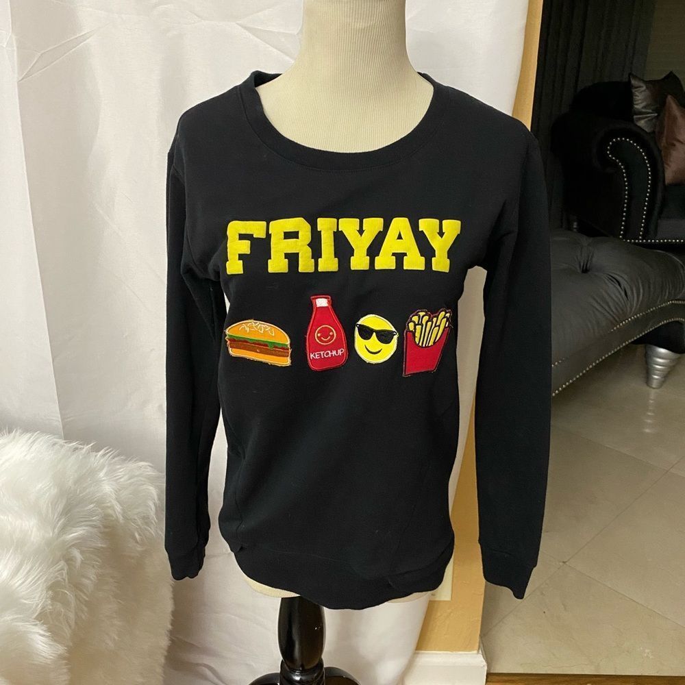 A Black long sleeve sweater with the word
"FRIYAY" size XS